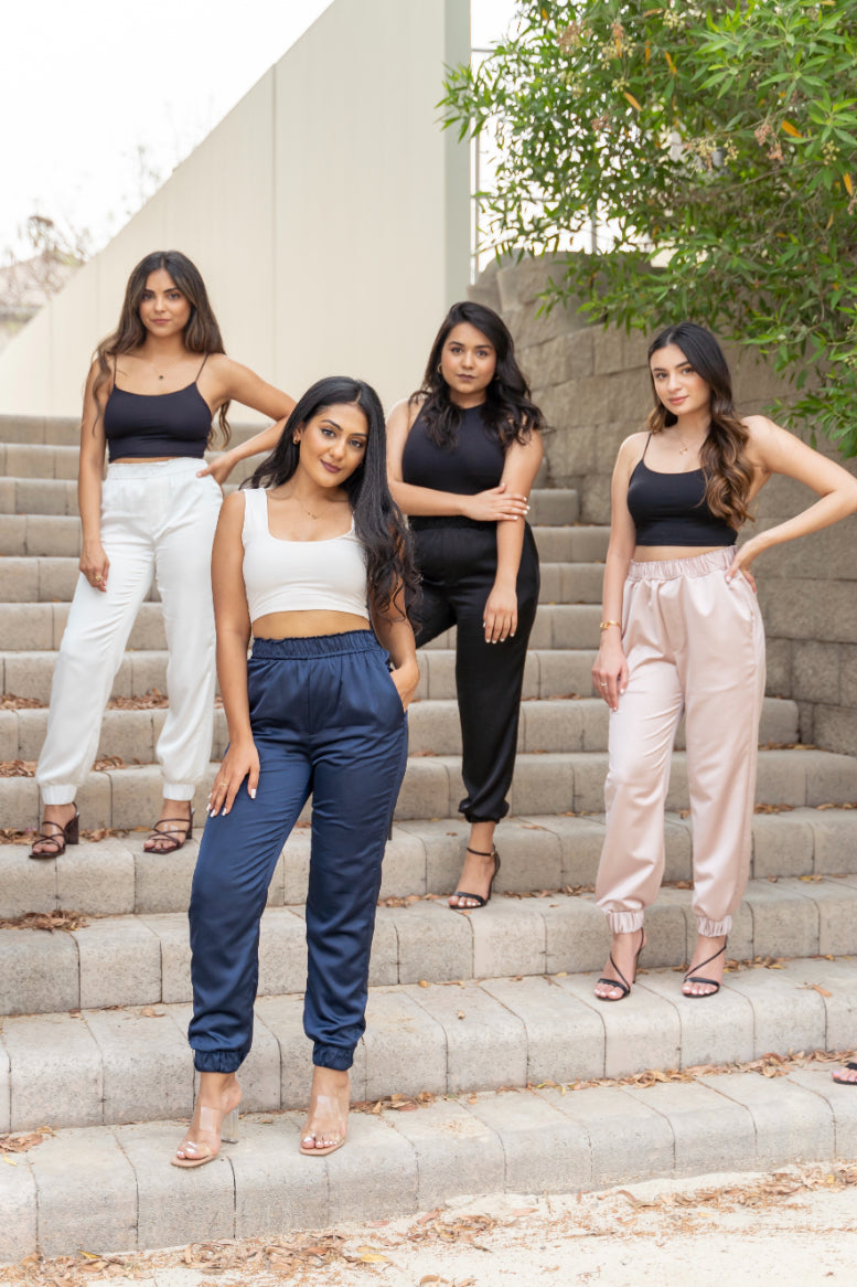 5 Girl in differently coloured ( midnight blue, charcoal black, blush pink, pearl white, emerald gren) silk Women sweatpants 